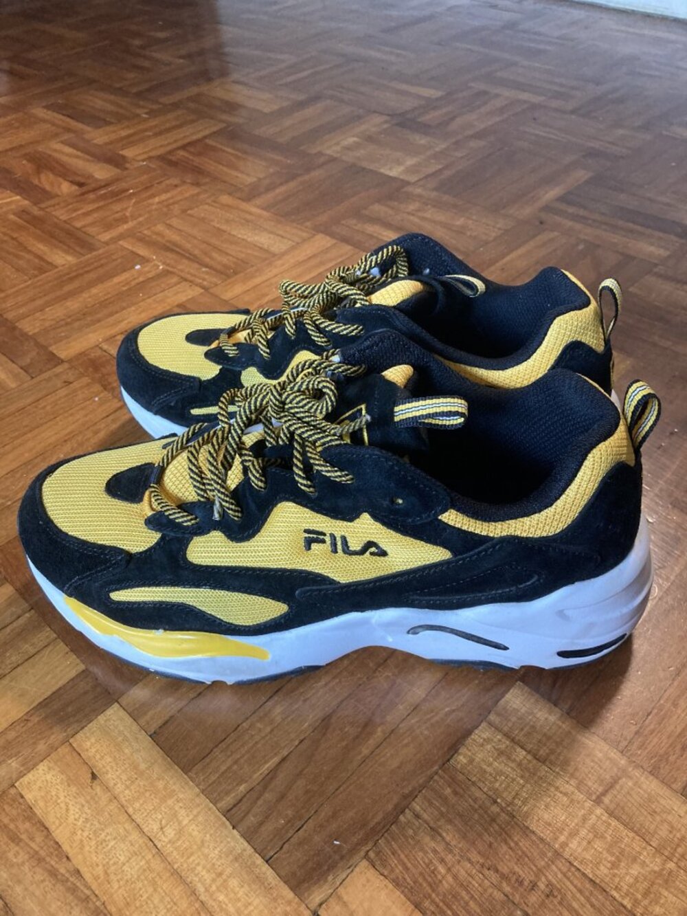Yellow and black Fila Ray Tracer sneakers (Women's Size 9)